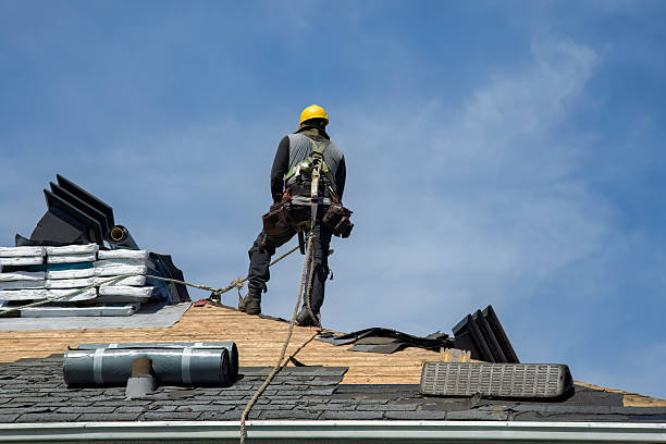 Professional Roof Replacement technician working in Newfield, ME